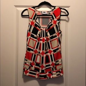 Orange, black and tan blouse